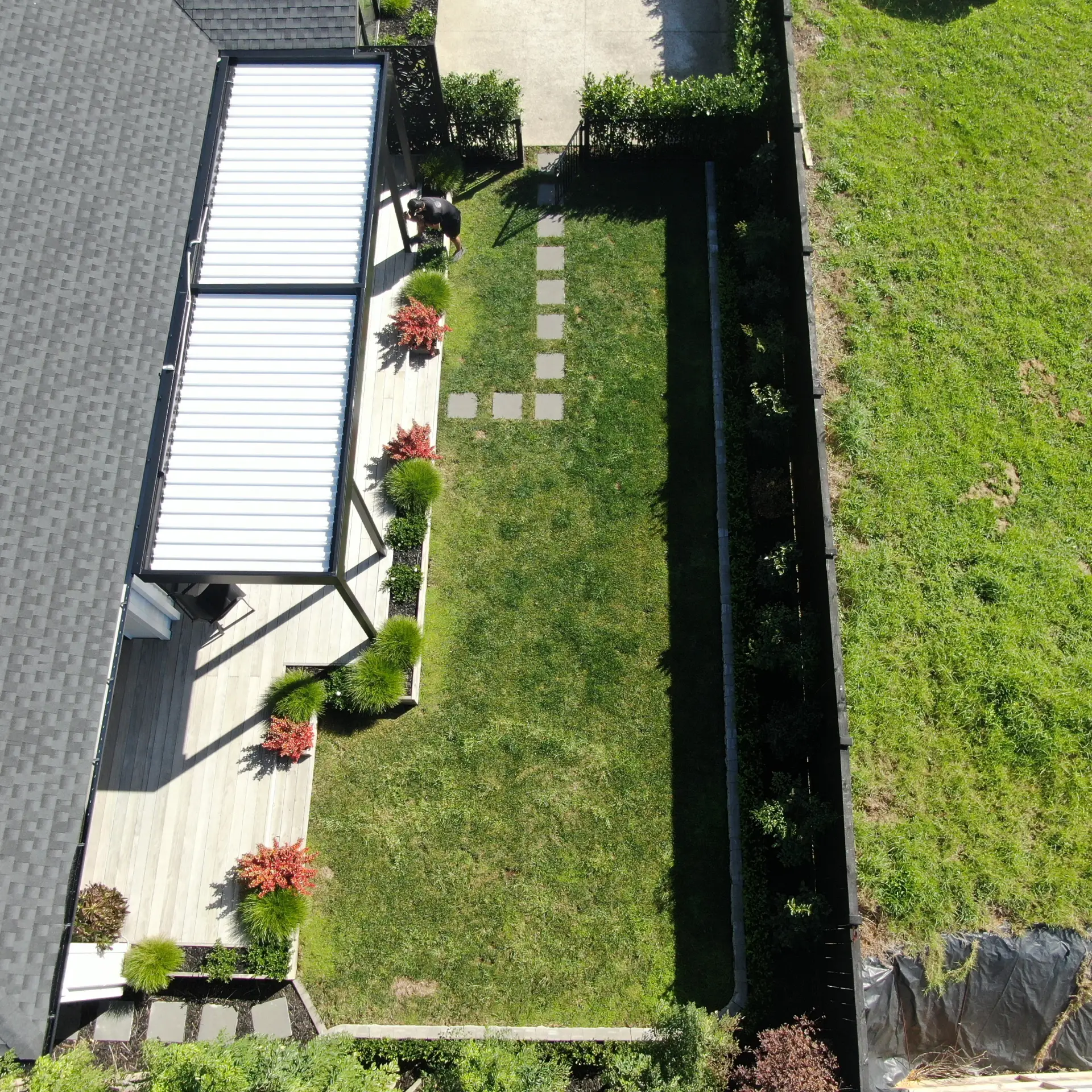 Pergolas modern design with backyard maintained park.
